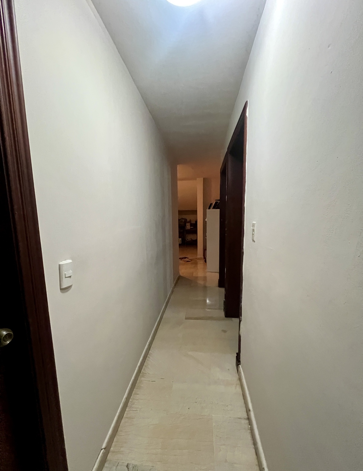 28 de 32: pasillo habitaciones
