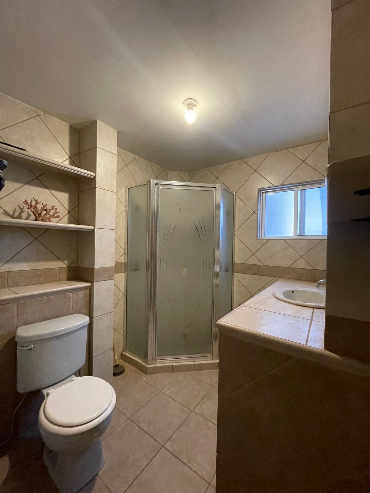 13 de 21: Baño de recámara secundaria 1