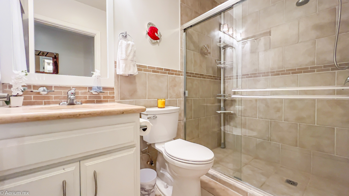 21 of 39: Third full bathroom