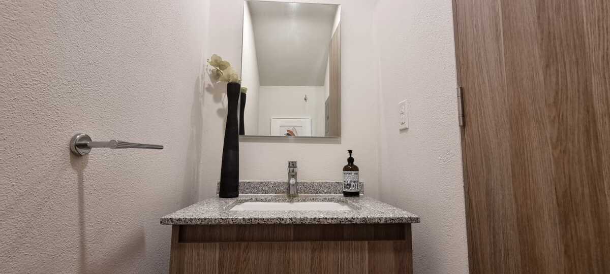 5 de 32: medio baño en planta baja