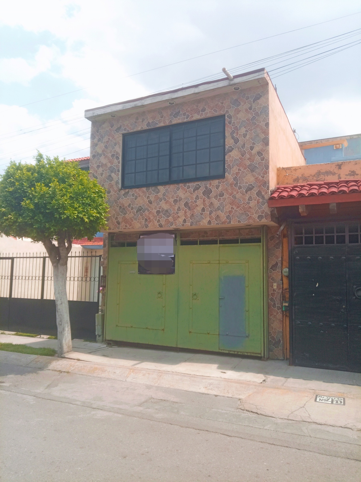 1 de 16: Frente de la casa