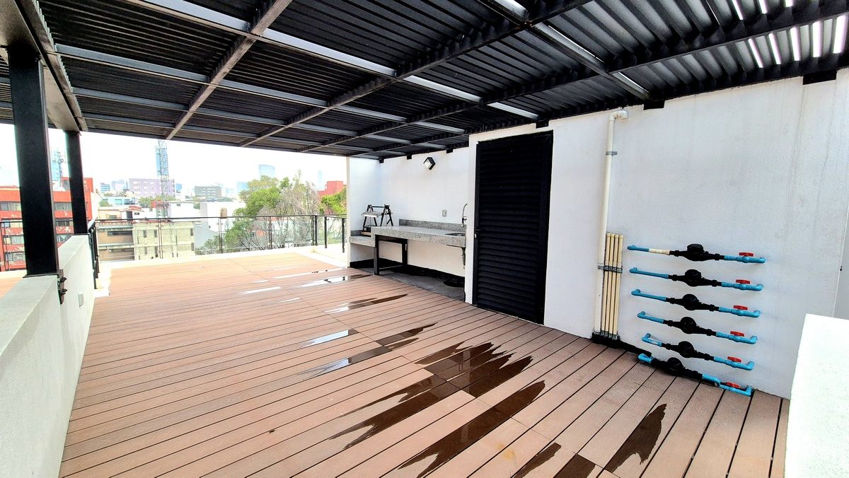 12 of 13: roof top con asadores