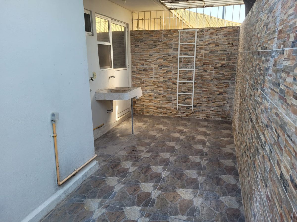 15 de 18: Patio/área de lavado