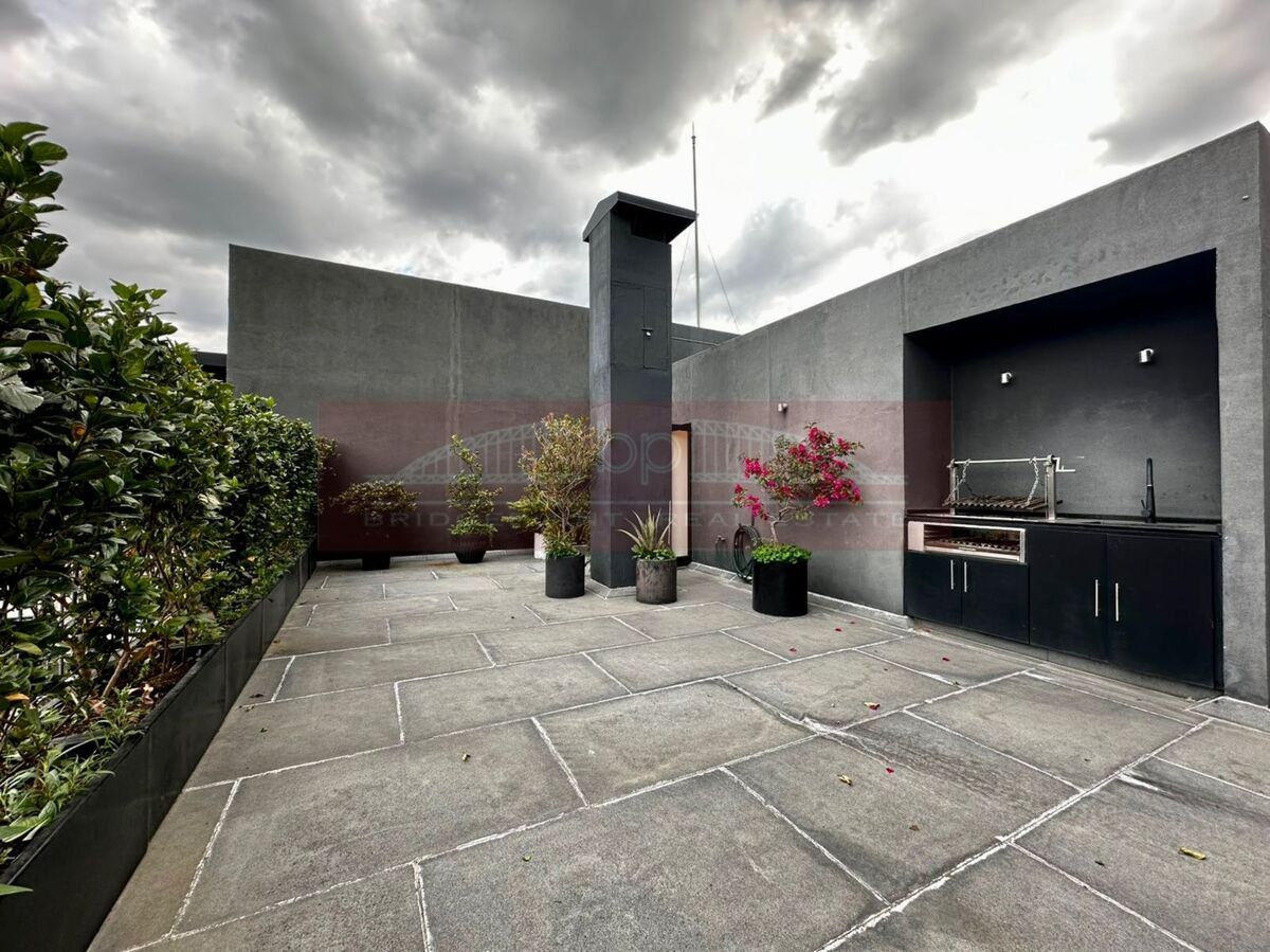 47 de 47: Terraza Privada con asador