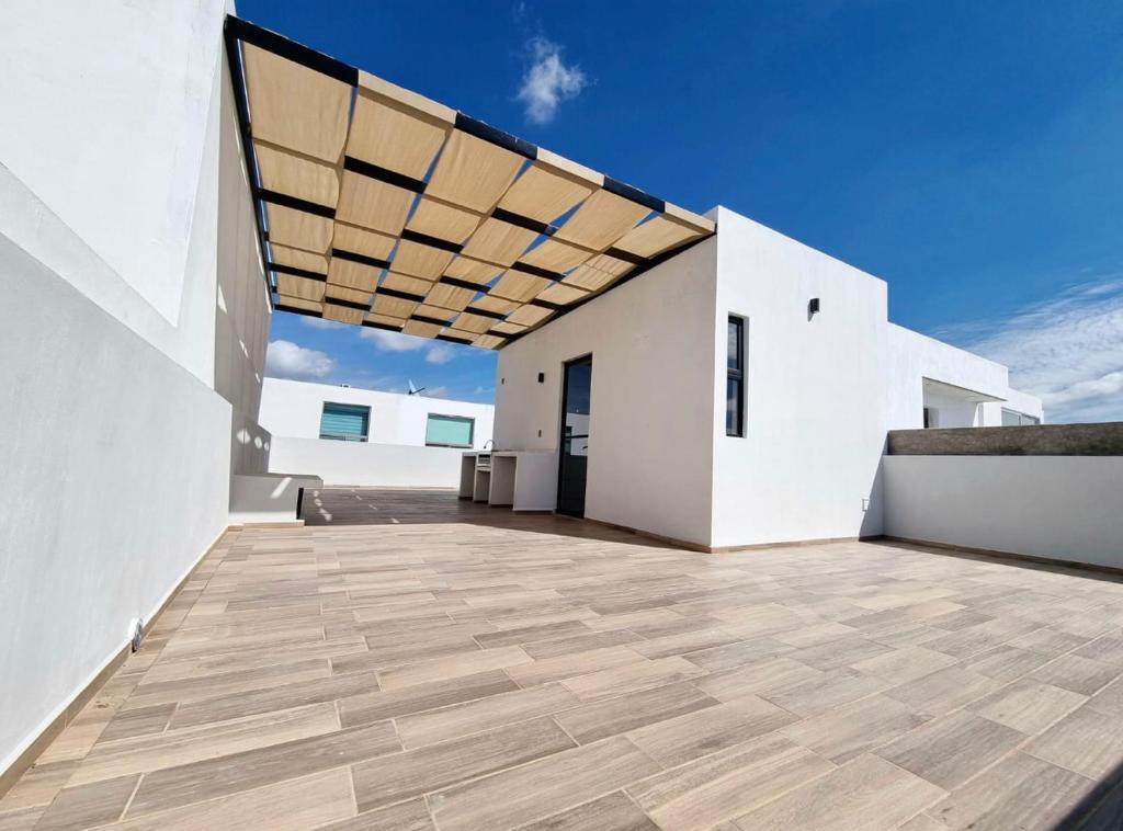 24 de 33: Area social en Roof Top