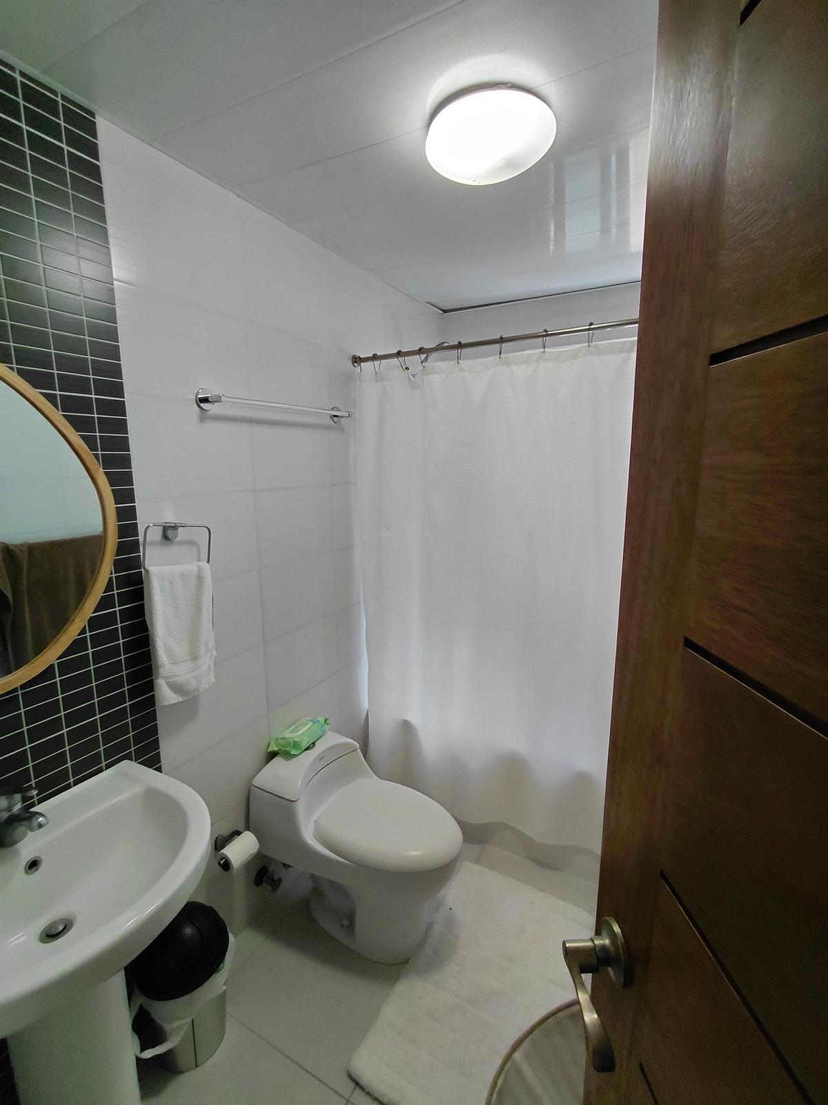 17 de 27: Baño común
