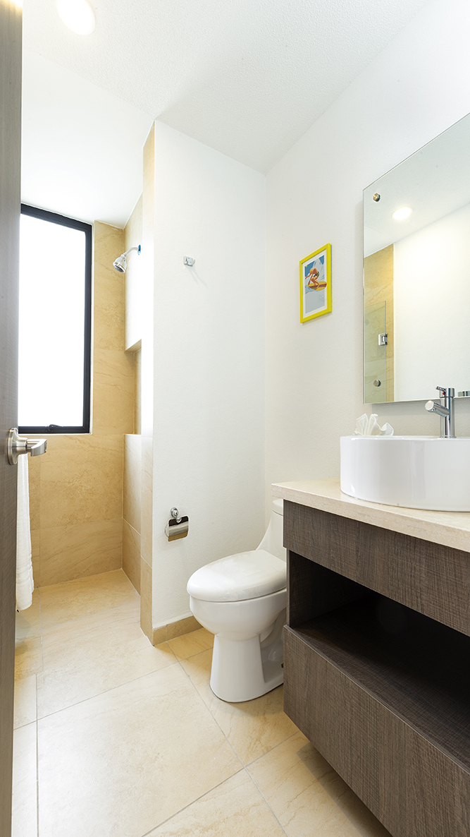 7 de 9: Baño compartido