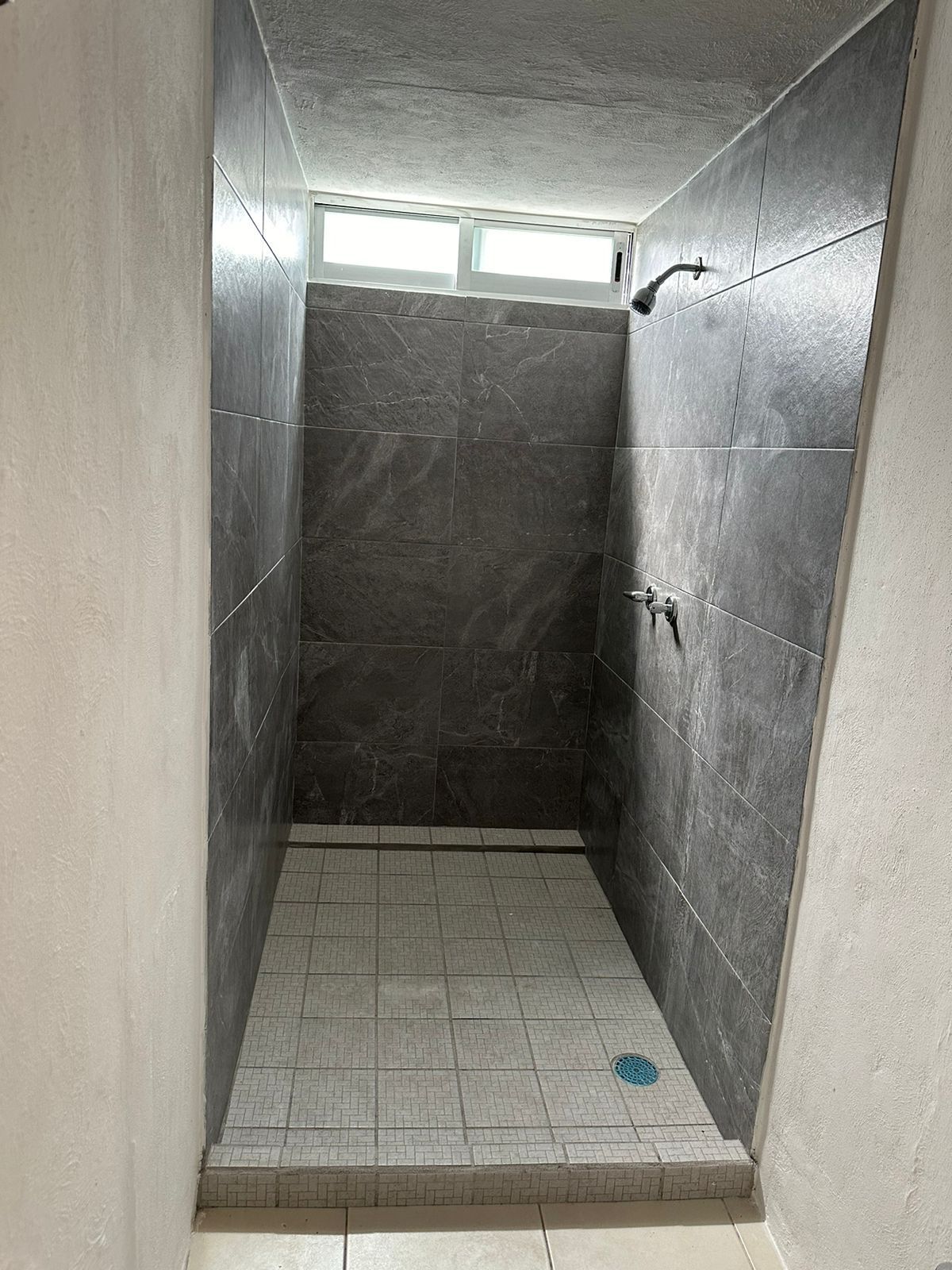 9 de 14: AREA DE REGADERA