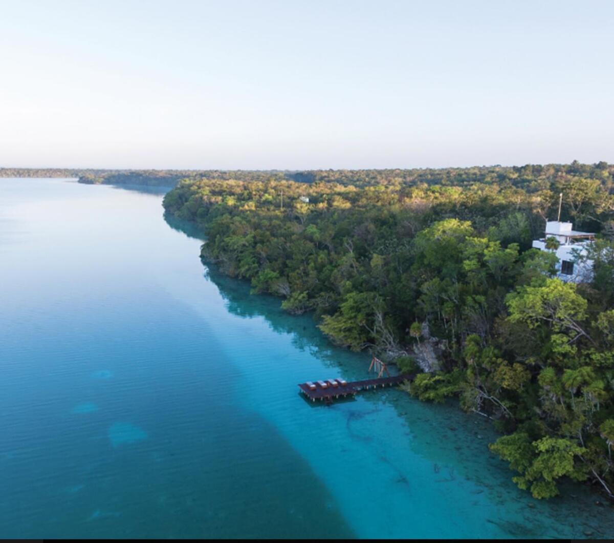 1 of 10: Casa muestra y muelle privado