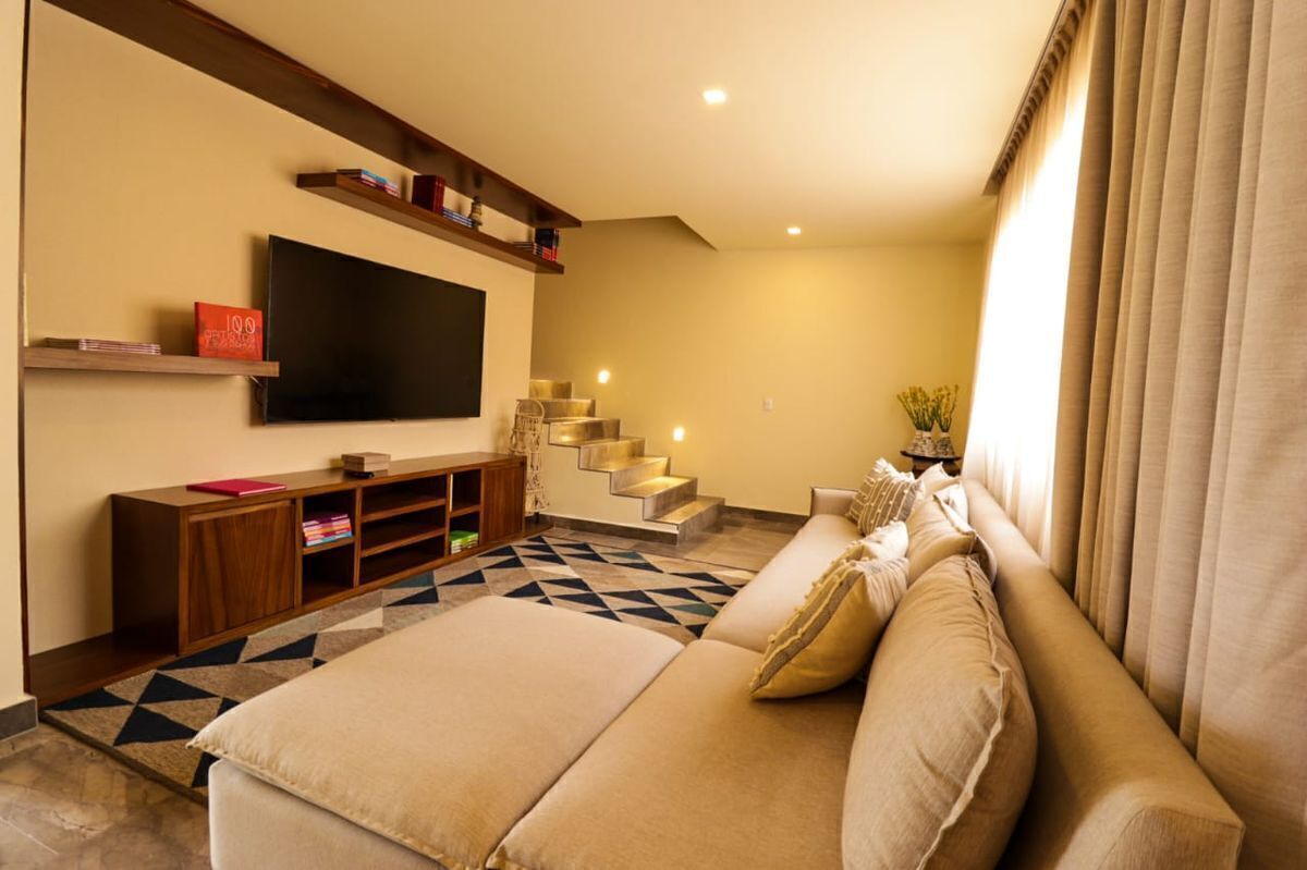 11 of 18: cuarto de tv.