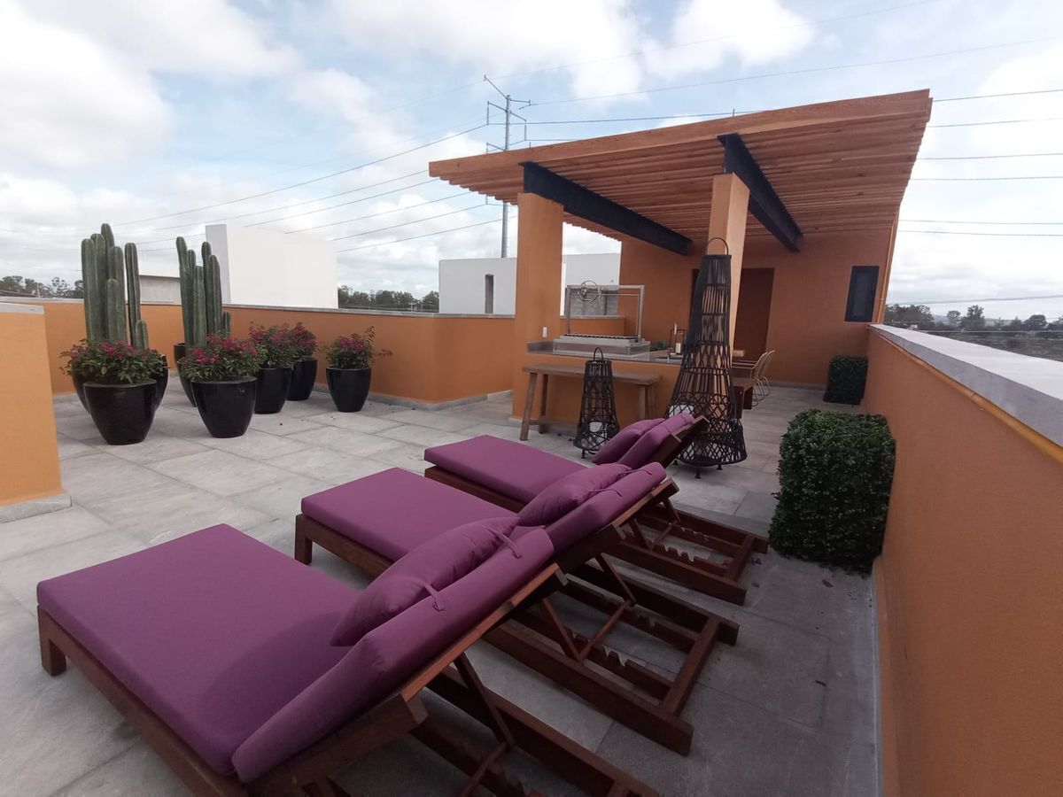 18 of 18: terraza con asador