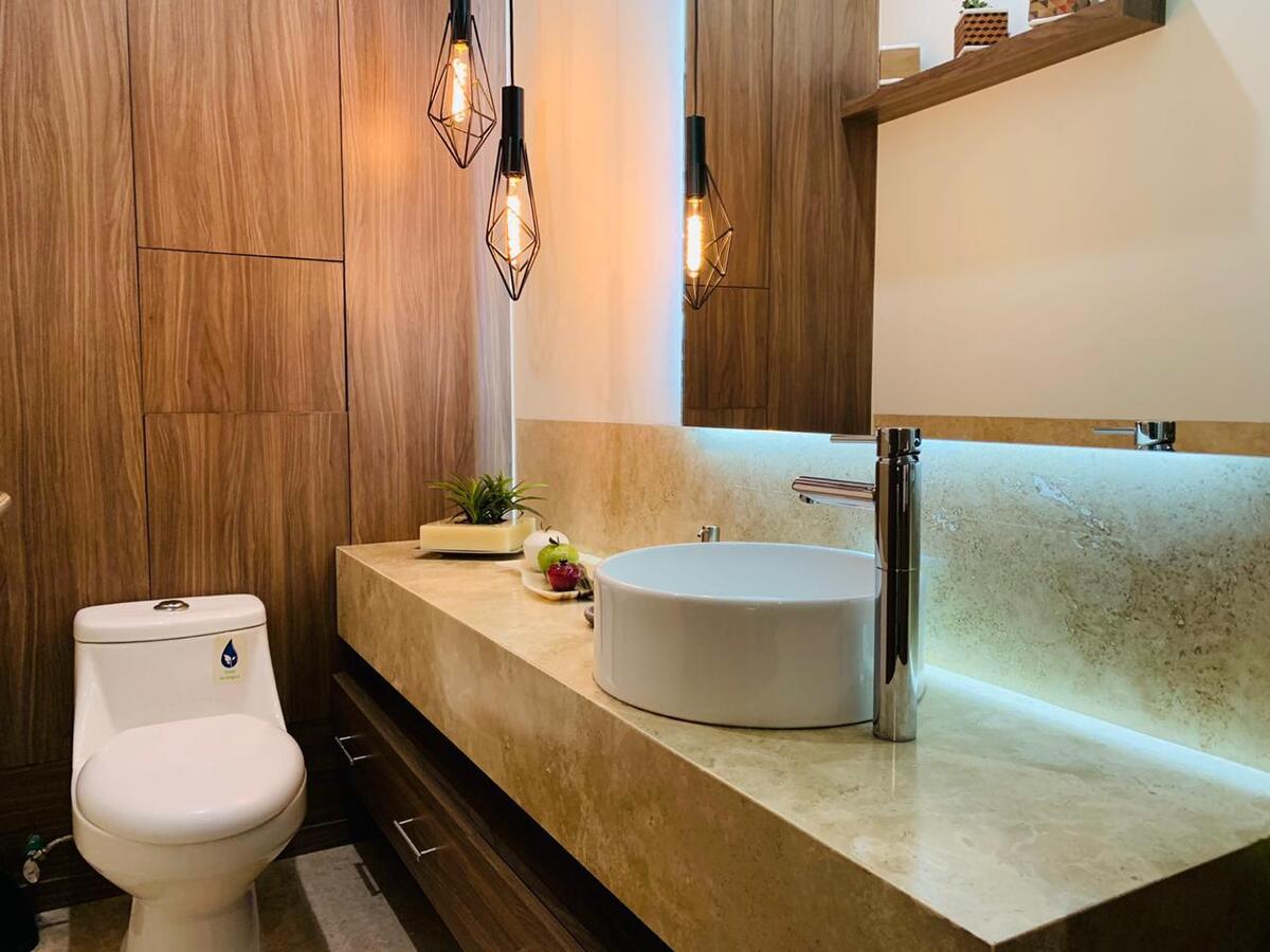 5 de 16: Baño visitas