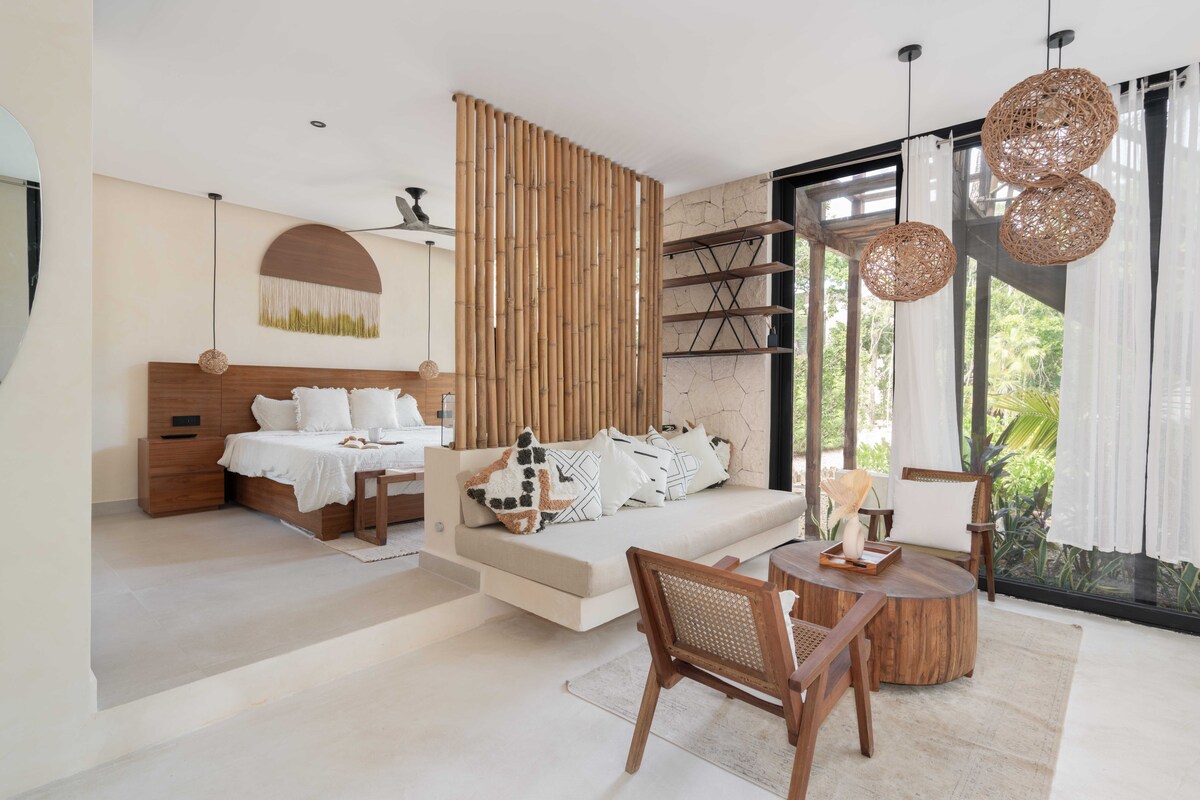 5 of 17: Open-Plan Living and Bedroom with Designer Touches