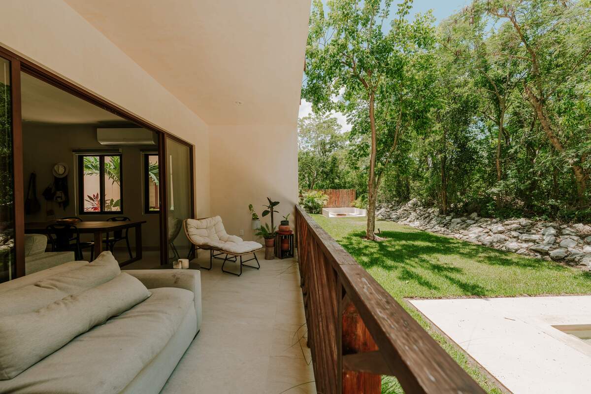 4 of 18: Pool facing Outdoor Living Area
