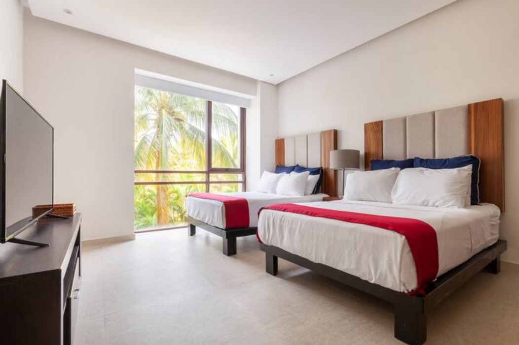 6 of 23: Recamara principal con 2 camas matrimoniales