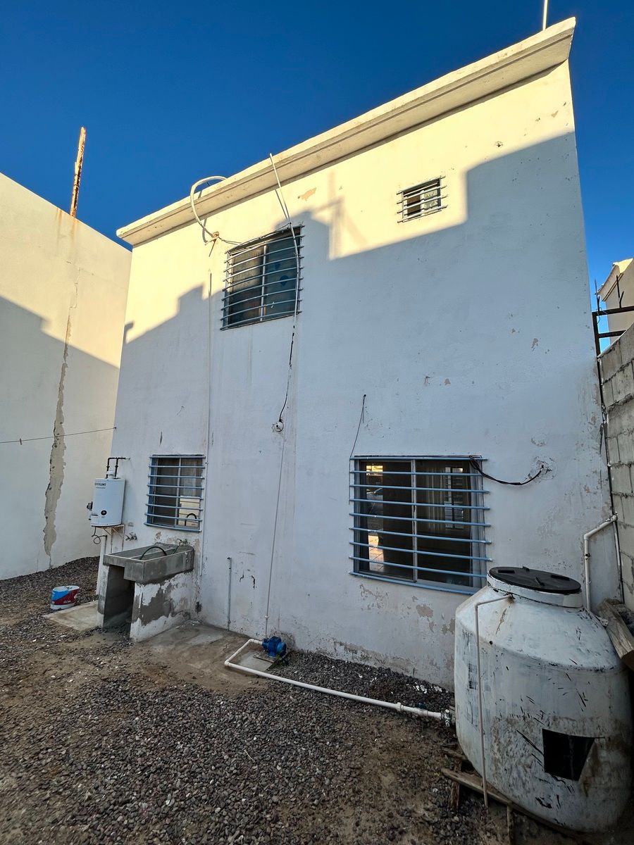 16 de 17: Zona de lavado, boiler y tinaco