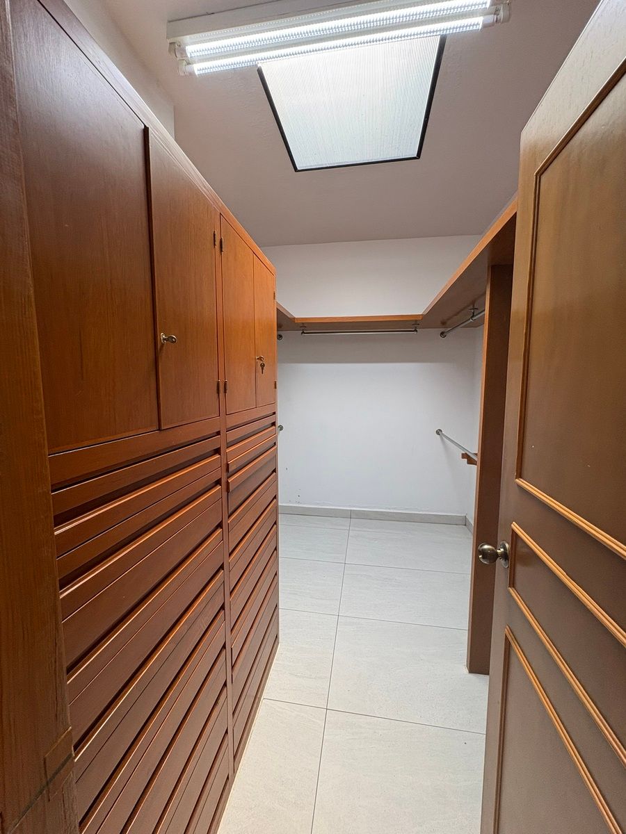 10 of 30: Walk in closet