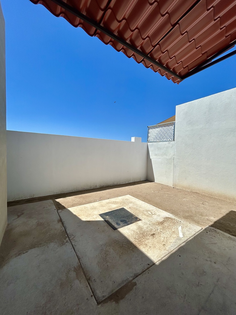 12 de 20: Patio techado / Cisterna