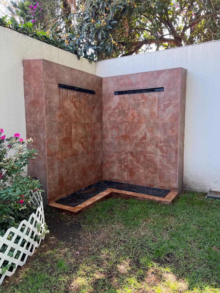 21 de 32: Fuente en Jardin