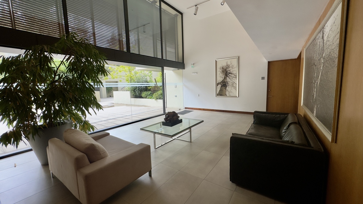 18 de 23: Living comun del edificio