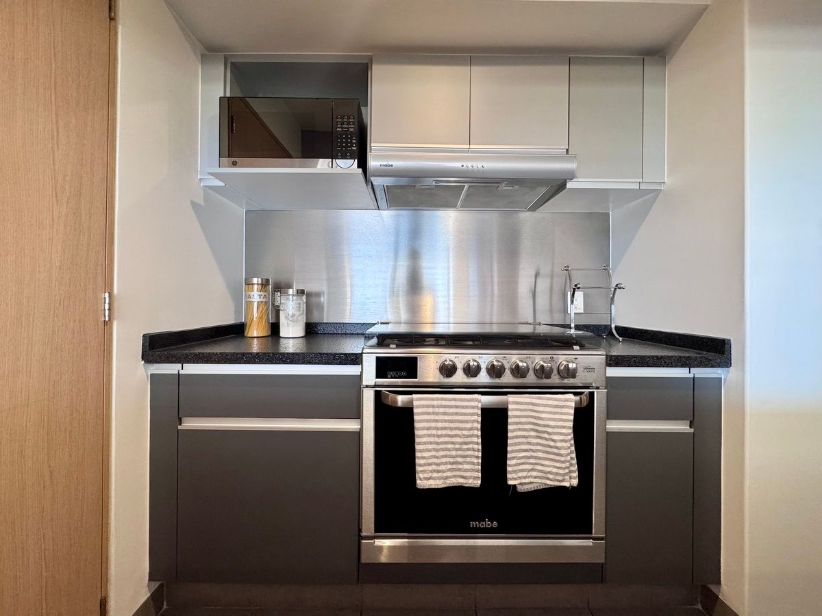 23 de 33: Cocina estufa