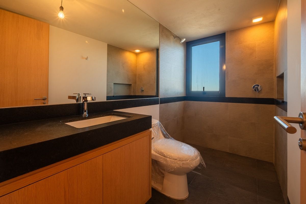 9 de 21: Baño común