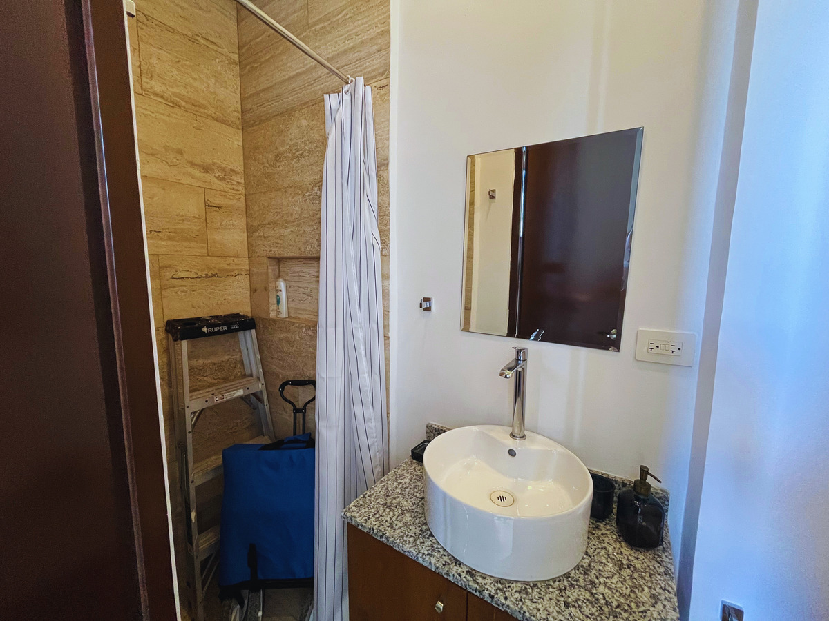 15 de 34: baño de servicio