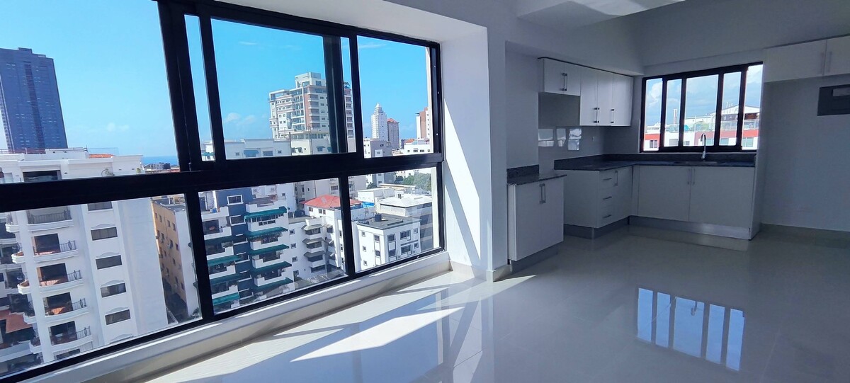 4 de 14: Ambientes integrados: sala, comedor y cocina conectados