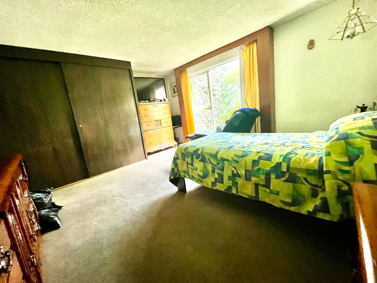 11 de 15: Recámara principal con vestidor y baño