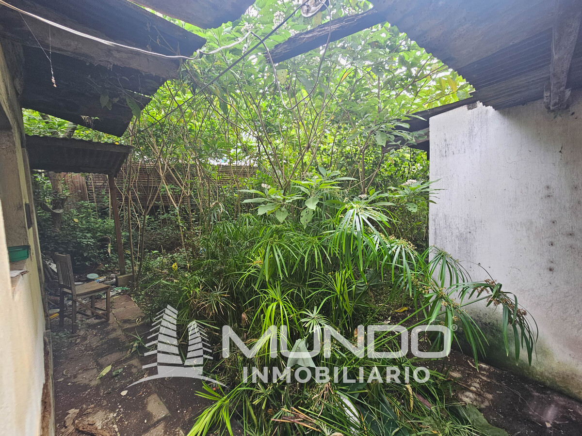 6 de 9: Terreno con una construcción para demoler