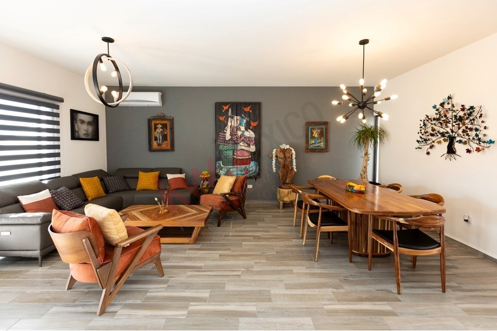 5 of 22: Open concept living dining room furnished San Miguel.