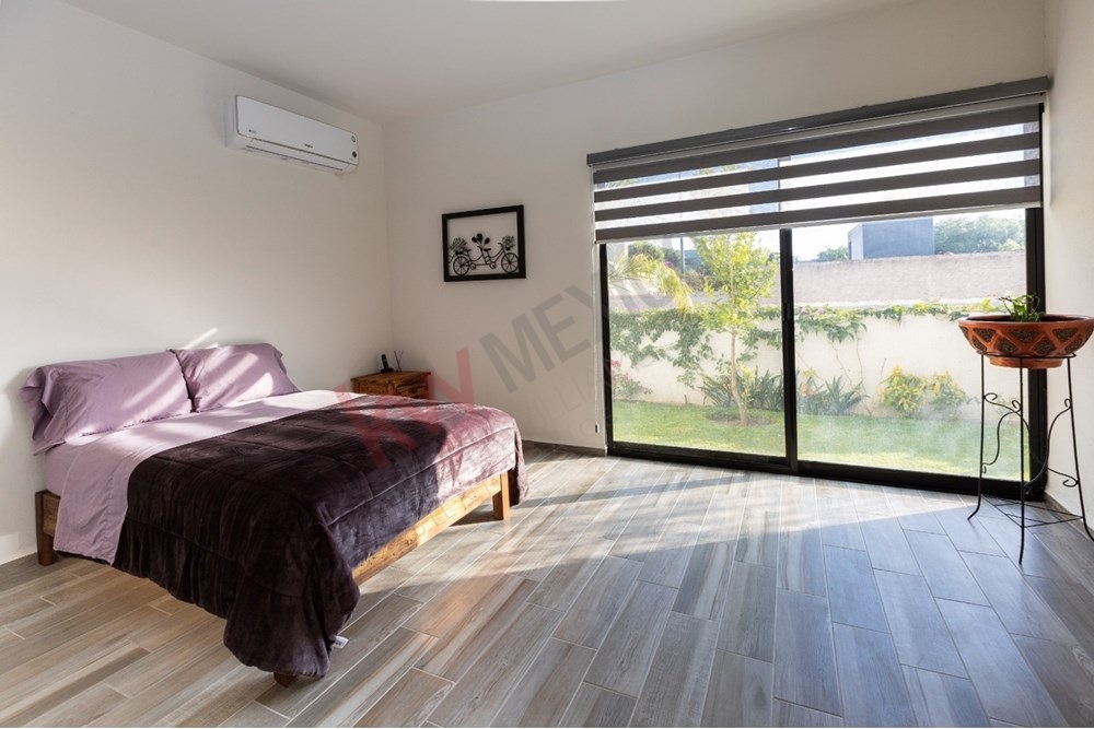 9 of 22: Main floor bedroom garden view San Miguel Allende.