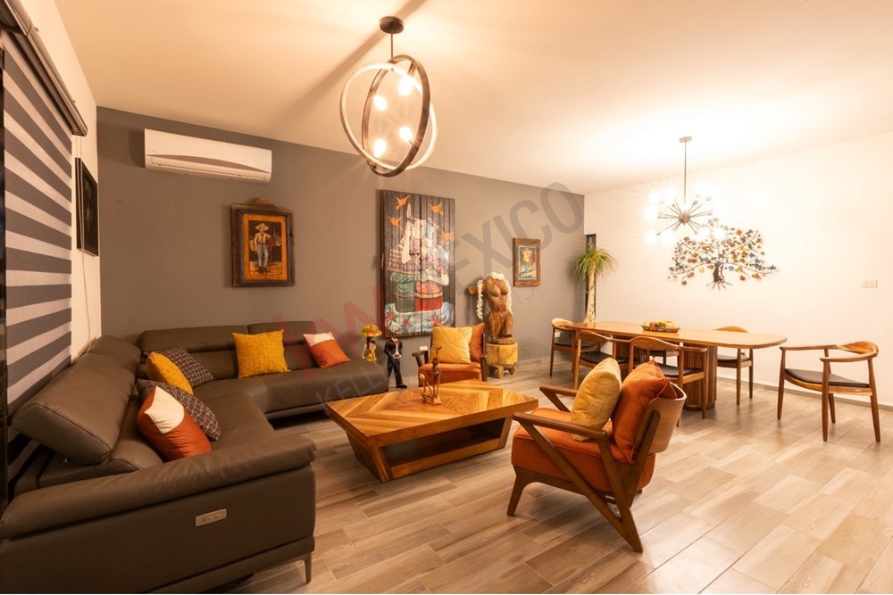 10 of 22: Elegantly furnished living dining room San Miguel Allende.