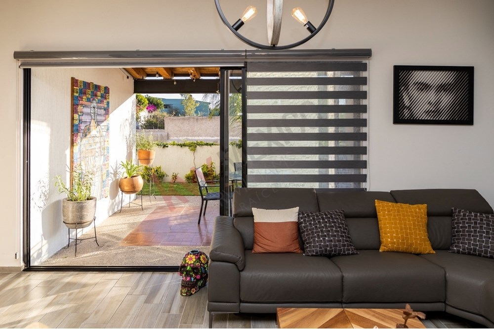 11 of 22: Living room view private garden patio San Miguel.