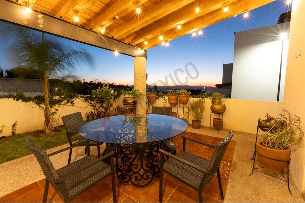 16 of 22: Patio at sunset, great for entertaining and dining.