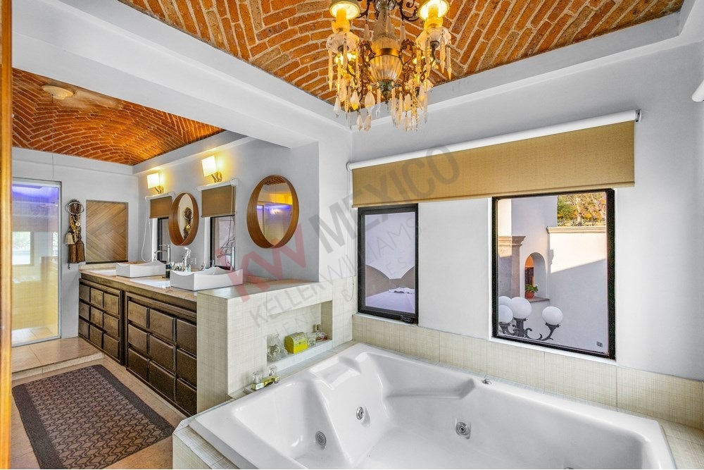 10 of 19: Master Bath, Barrel Vault, Jacuzzi Tub, Dual Vanity.