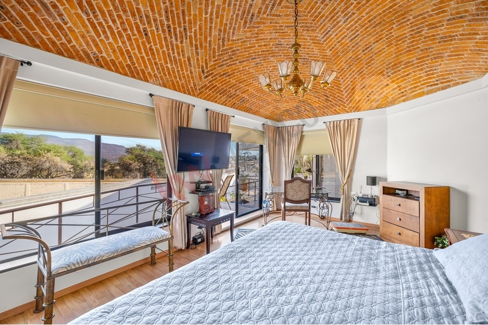 12 of 19: Master Bedroom, Catalan Vault Ceiling, Panoramic Views,