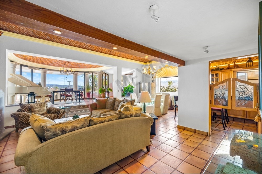 14 of 19: Colonial living room with terrace view San Miguel.