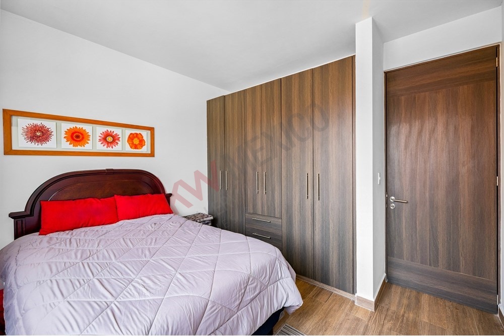 13 of 27: Built-in Wood Grain Closet, Full-Length Storage.