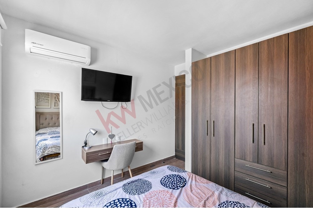 16 of 27: Built-in Closet, Air Conditioning, Floating Desk.