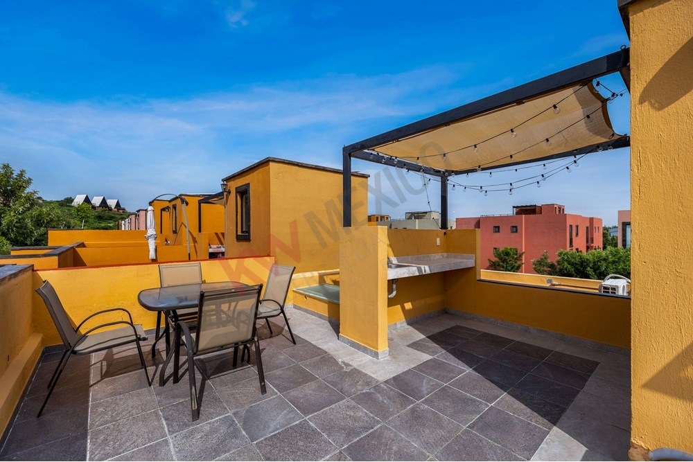 18 of 27: Private Rooftop Terrace, Outdoor Grill, Covered Seating.