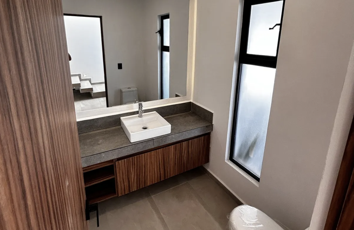 7 de 16: Medio baño