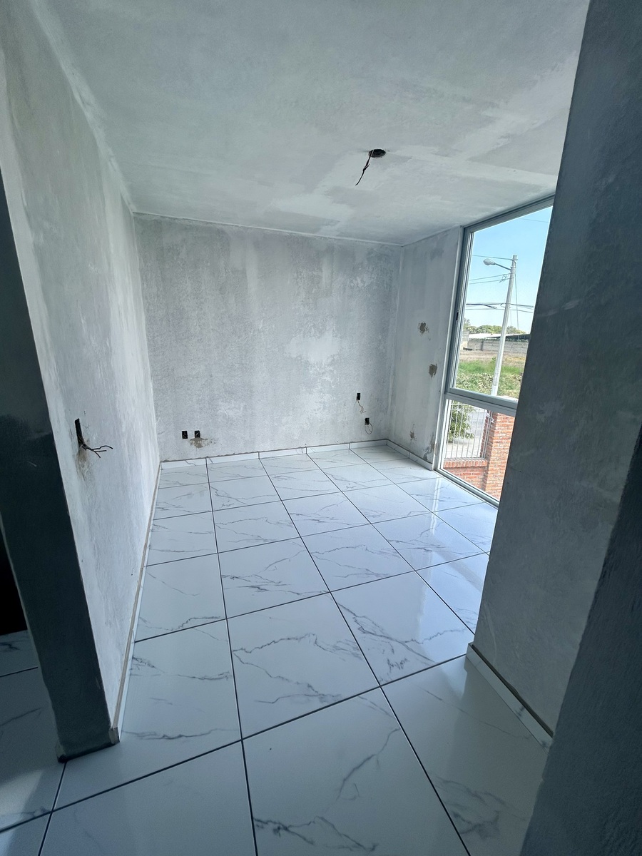 6 de 13: Cuarto principal con vestidor y baño