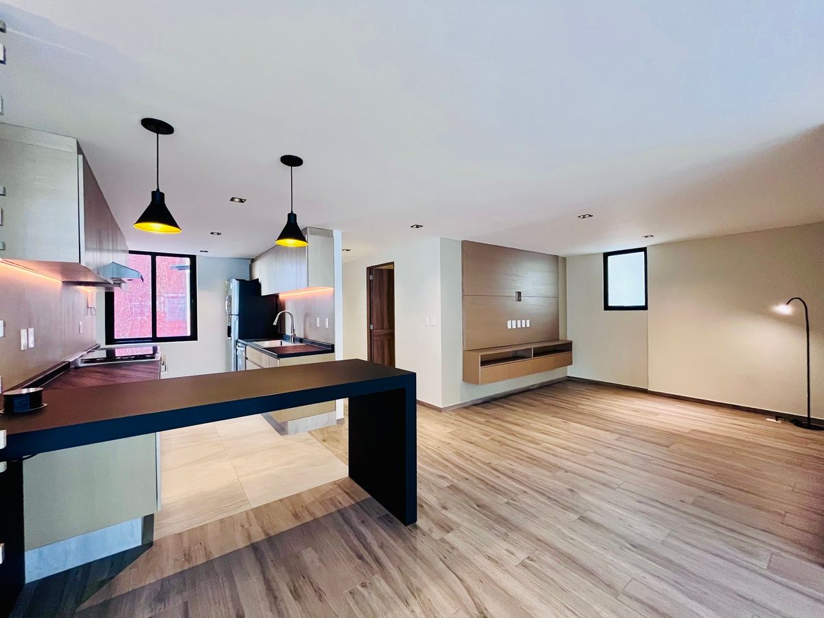 3 de 26: Vista cocina y área de tv