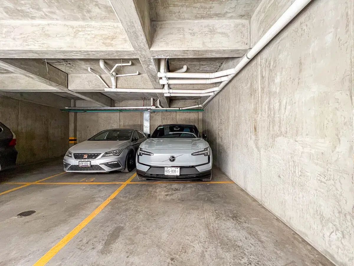 14 de 15: Estacionamiento se coordina con dos vecinos