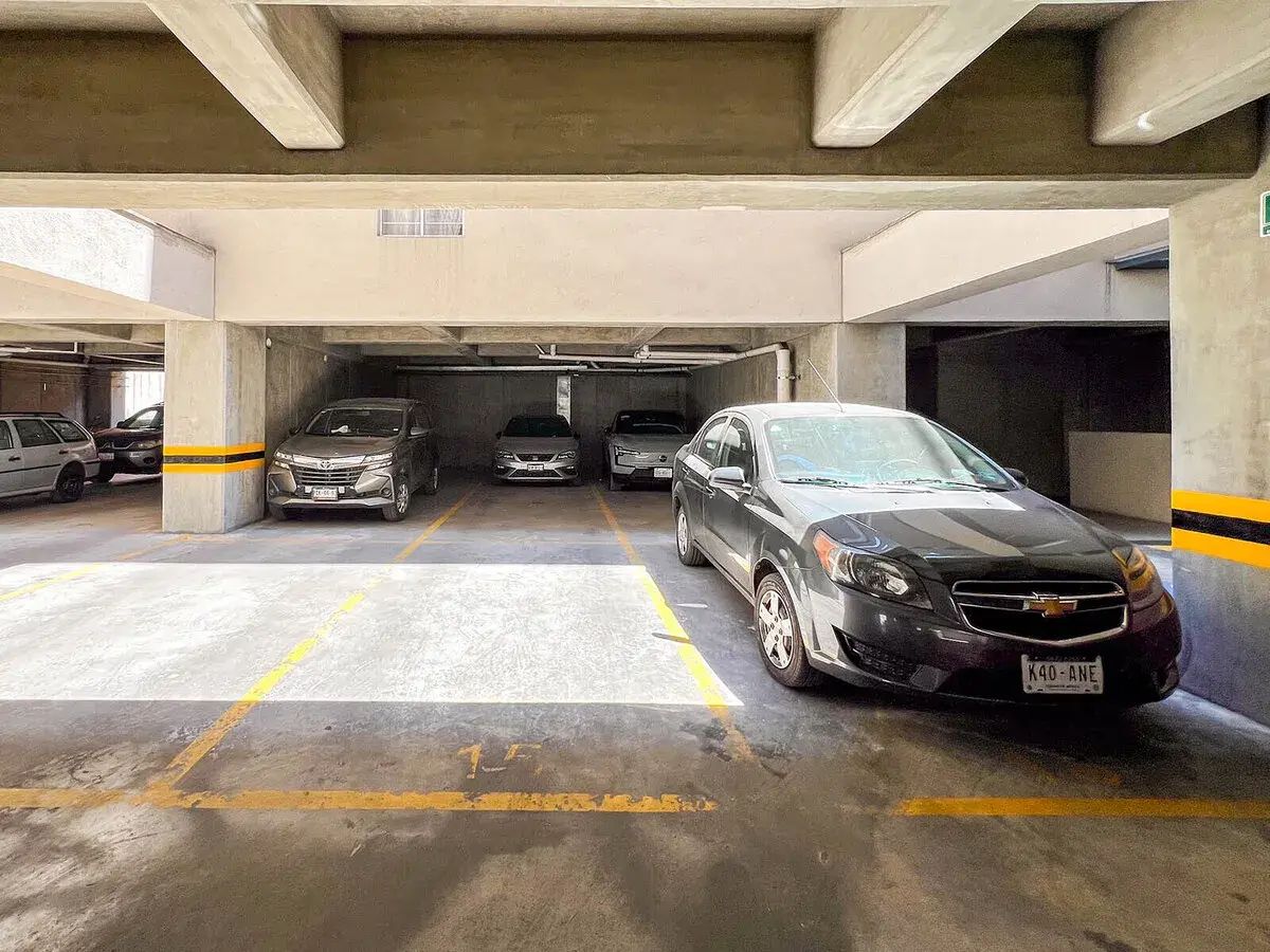 13 de 15: Estacionamiento se coordina con dos vecinos