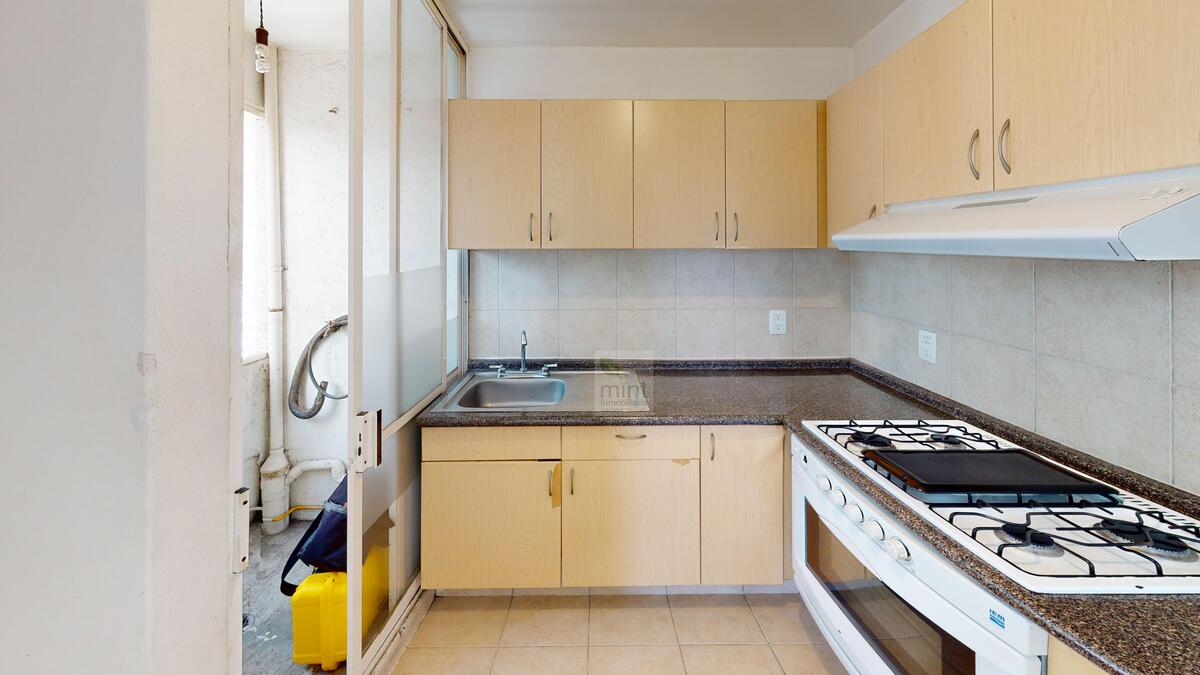 13 de 17: Cocina Integral y Área de Lavado