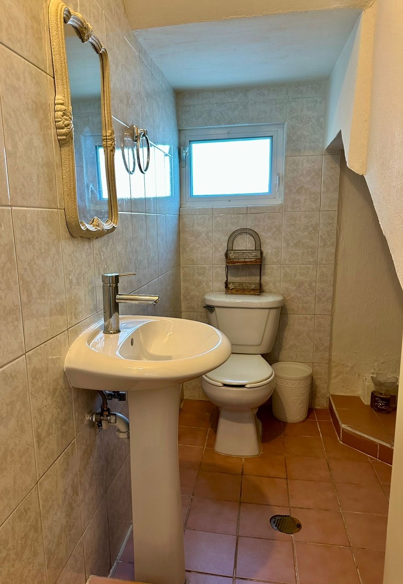 16 de 30: Medio baño en planta baja