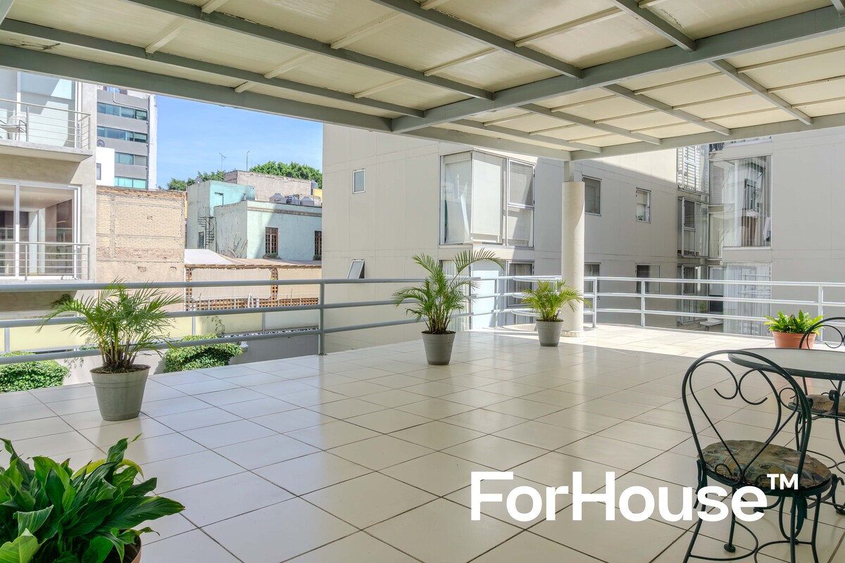 21 de 23: Terraza común