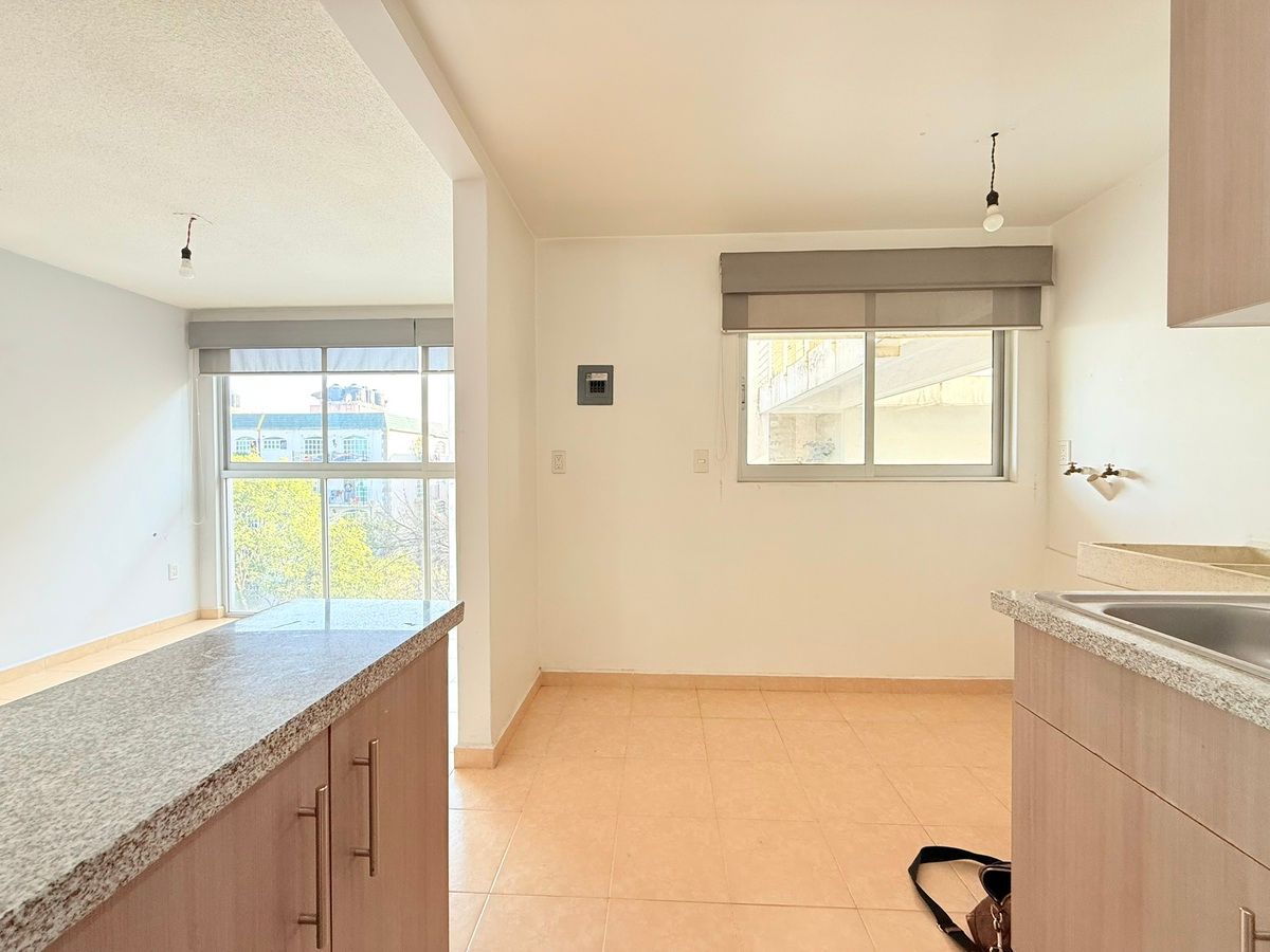 3 de 12: Cocina integrada con área de lavado